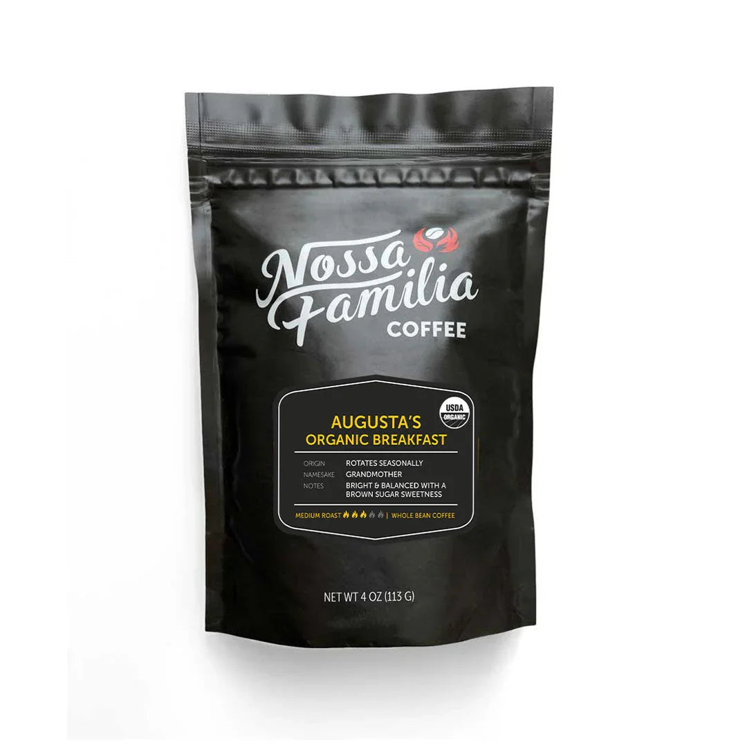 Nossa Familia Augusta's Organic Breakfast medium roast whole bean coffee bag. USDA Organic seal, brown sugar sweetness notes.
