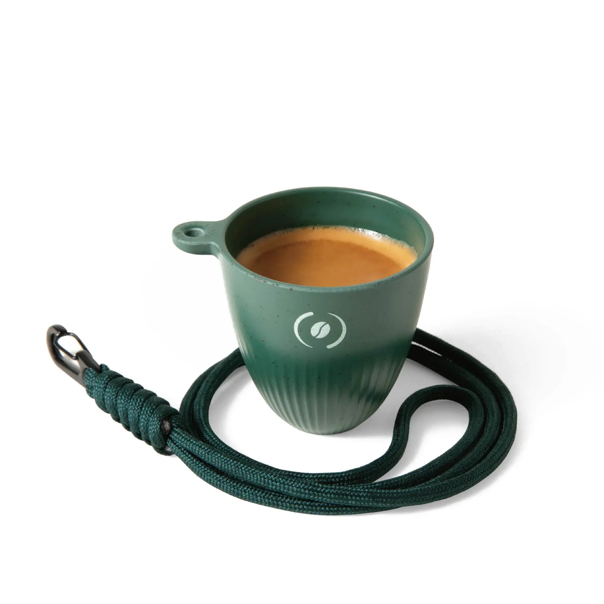 OutIn Rebrew dark green ribbed espresso cup filled with coffee, with lanyard and coffee bean logo.
