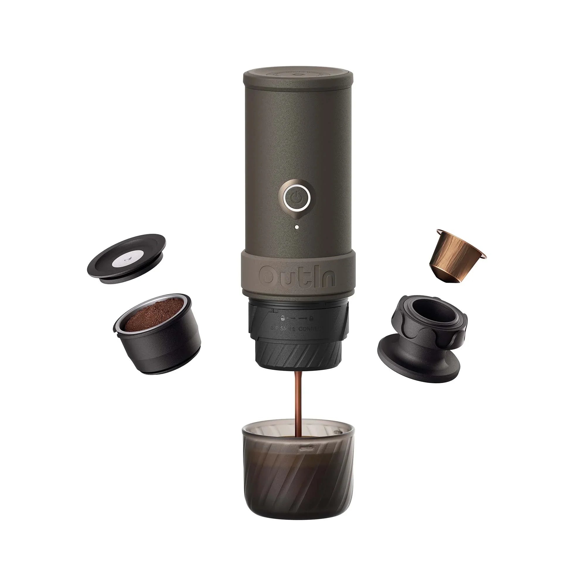 Dark gray OutIn portable espresso machine brewing coffee into a cup, with grounds pod & capsule components.