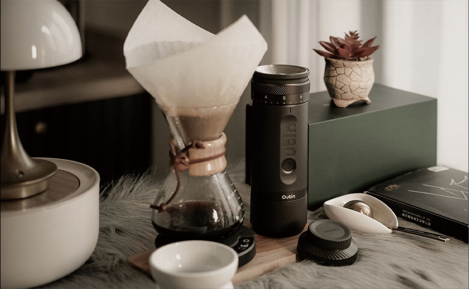 OutIn Fino coffee grinder in a travel brewing setup