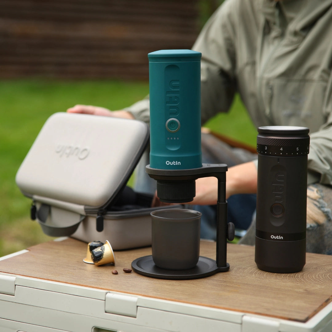 Outin Nano portable coffee machine on adjustable coffee stand and an Outin Fino electric portable coffee grinder, protective case.