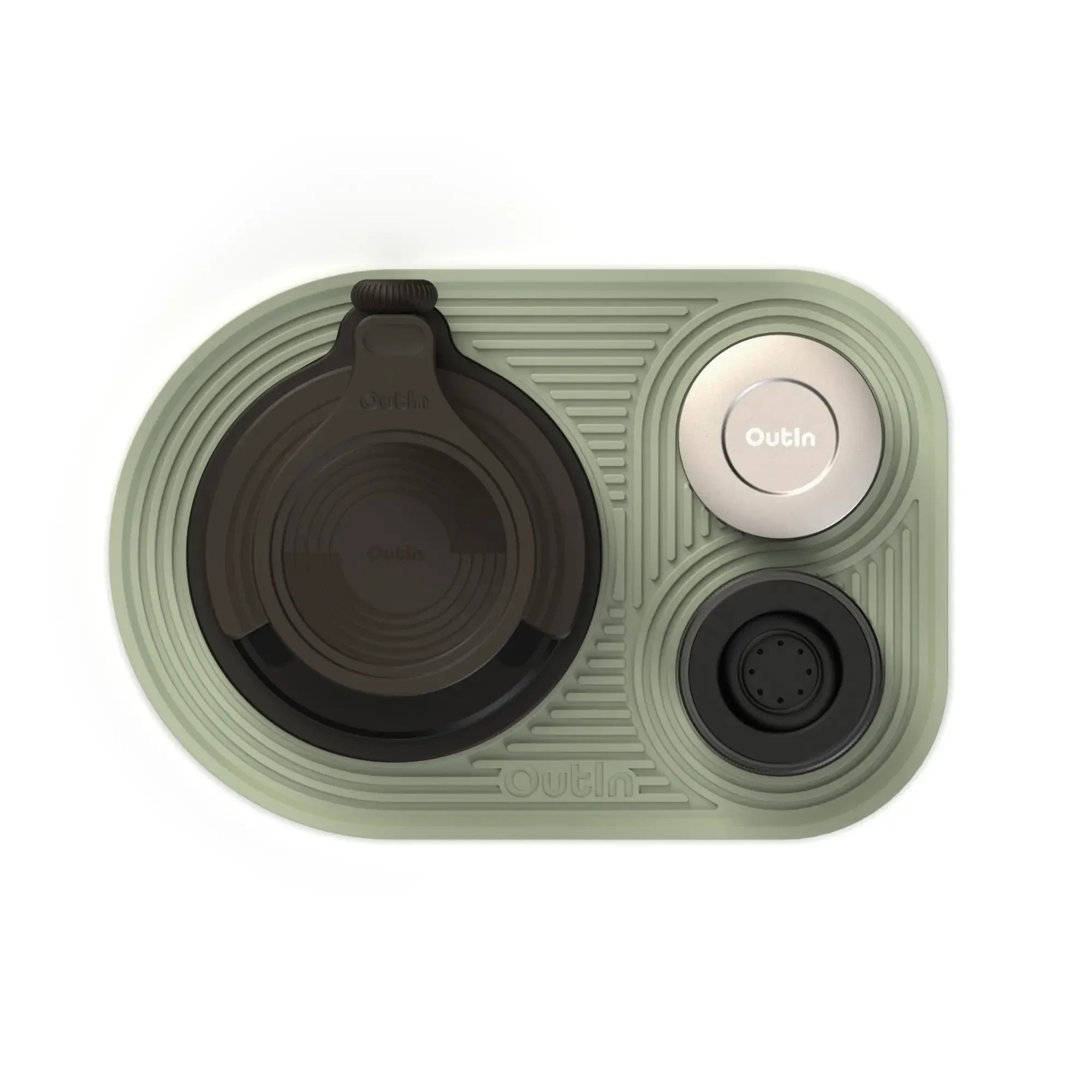OutIn sage green silicone coffee mat with portafilter rest, dosing cup holder, and tamper stand.