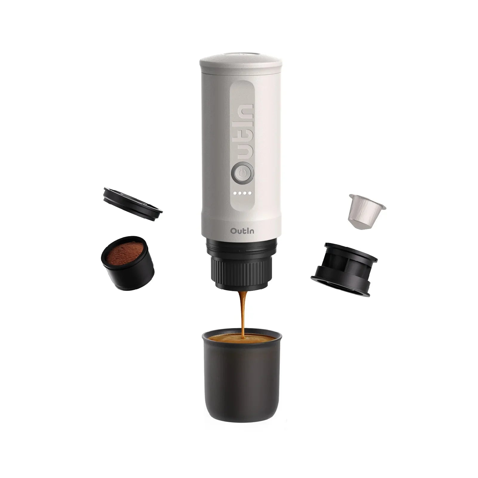 Pearl white Nano espresso machine brewing with crema, shows ground coffee and capsule parts.