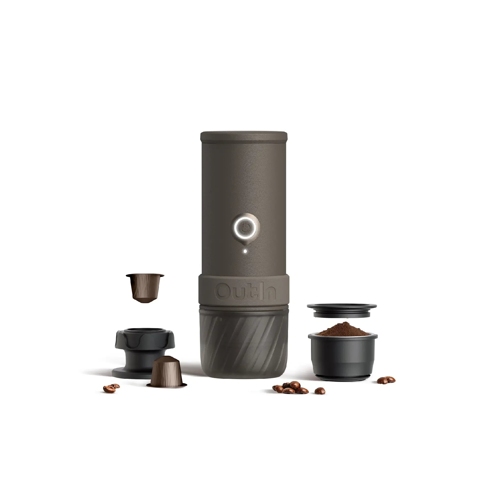 Dark gray OutIn portable espresso machine with coffee pods, grounds, tamper, and beans. Shows product and components.