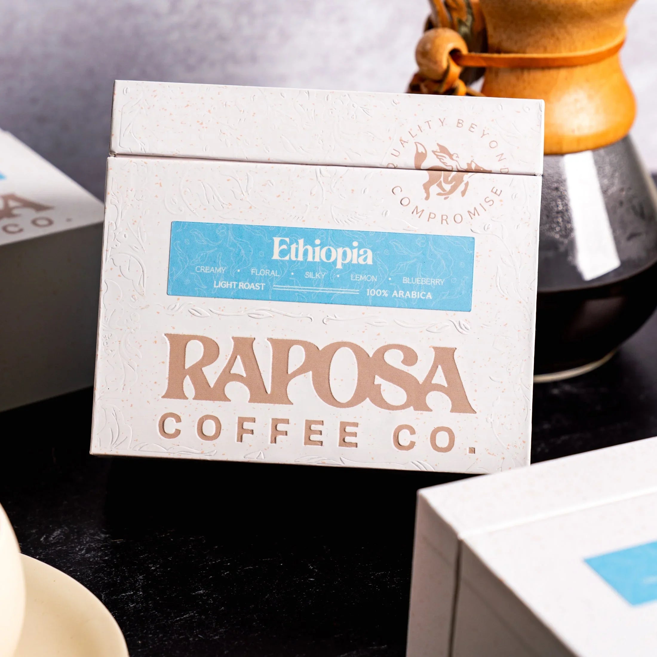 Raposa Coffee Ethiopia Light Roast 250g whole coffee beans box, floral pattern, creamy, floral, lemon, blueberry notes.