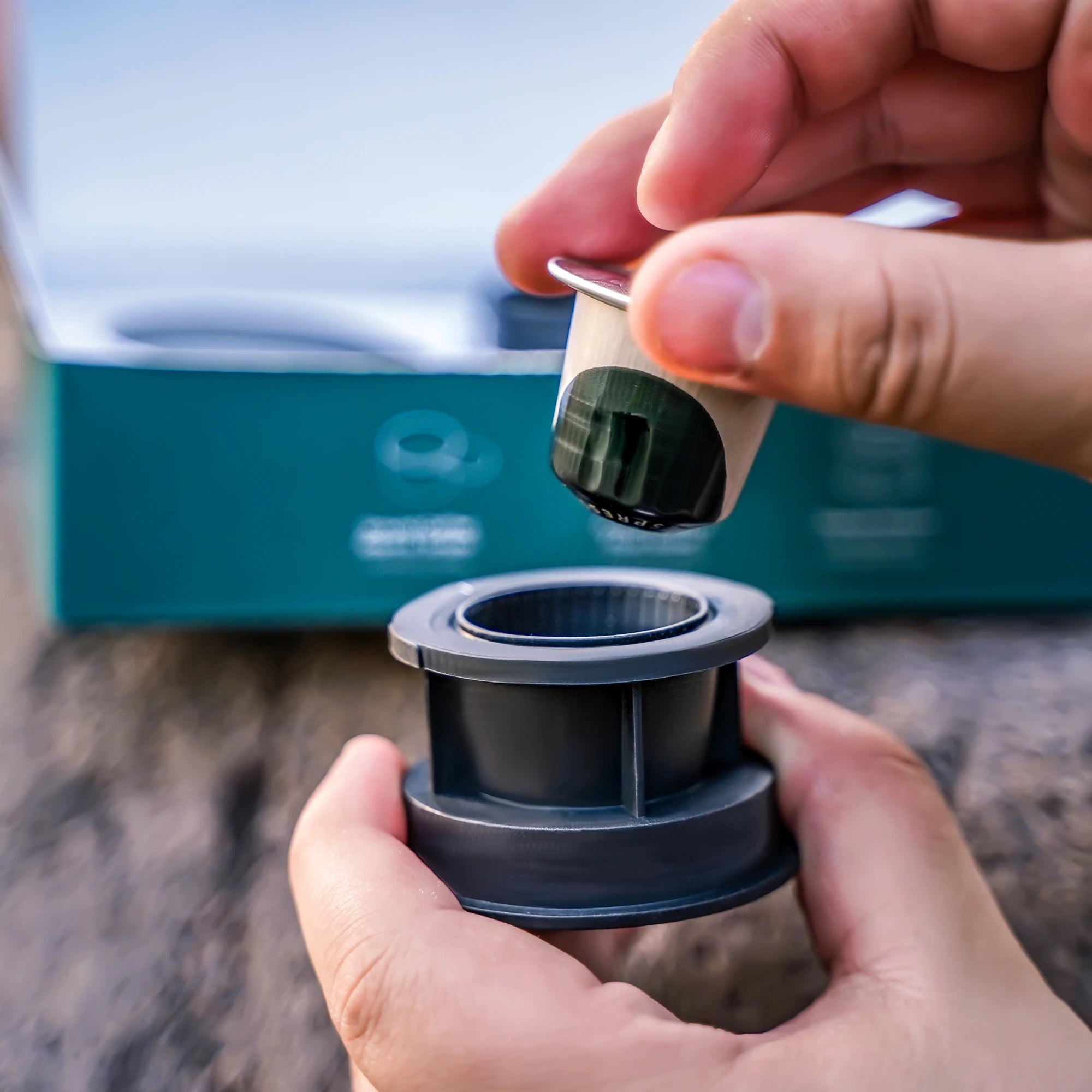 User demonstrating Capsule Adapter installation for Outin Nano portable espresso machine