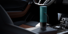 Portable coffee maker charging in a car
