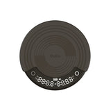 OutIn Claro coffee scale in dark gray, round design with concentric texture, showing timer, weight, and brewing modes M1/M2.
