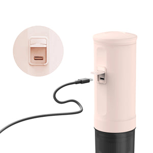 Close-up of Rose Quartz Nano Portable Espresso Machine charging port with USB cable