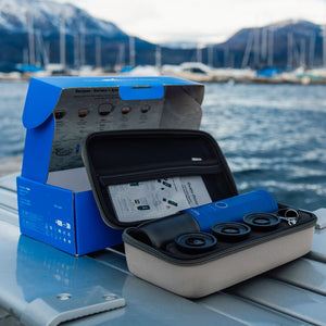 Ocean Blue Nano Portable Espresso Machine Set showing the machine and accessories inside the protective case.