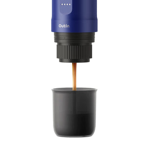 Ocean Blue Nano Portable Espresso Machine brewing espresso into a cup.